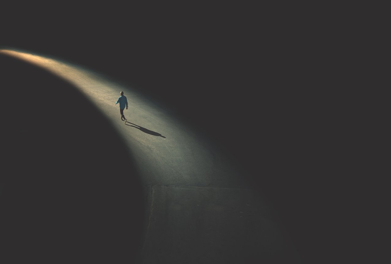 man walking in the night