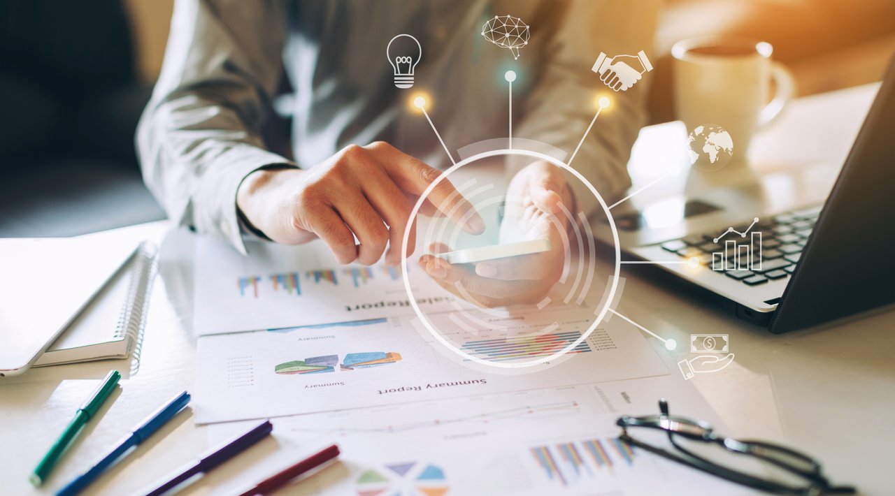 Businessman working on project for SWOT analyzing company financial report balance with augmented reality graphics at modern office space. Concept for business, economy, marketing and strategy.