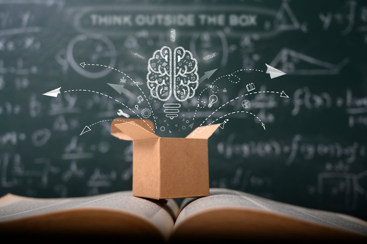 think outside the box on school green blackboard. startup education concept. creative idea. leadership.